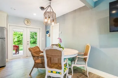 a view of a dining room with furniture window and outside view