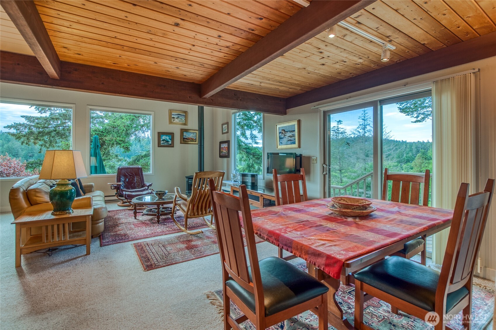 402 Cayou Valley Road Orcas Island, WA 98245 - Photo 21 of 40 a view of a dining room with furniture window and outside view
