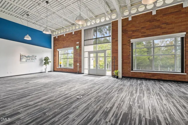 a kitchen with sink and cabinets