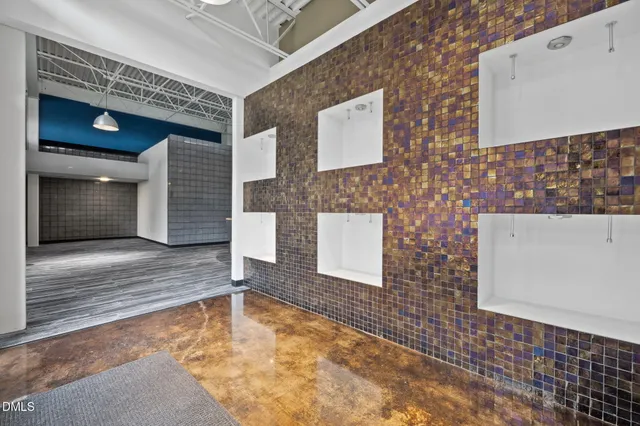 a bathroom with a sink and a shower