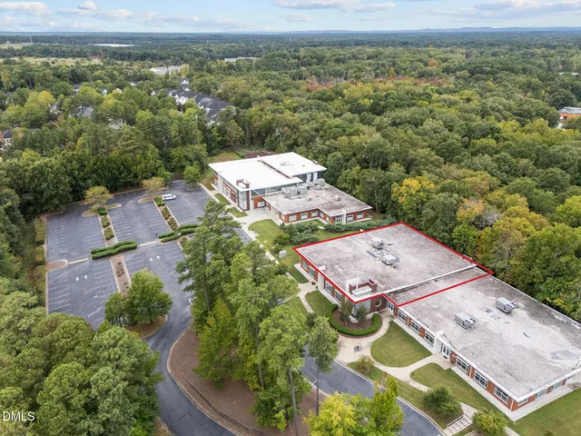 an aerial view of a house having yard