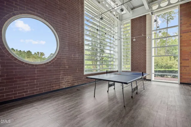 a view of kitchen with furniture and wooden floor