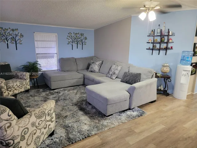a living room with furniture and a couch