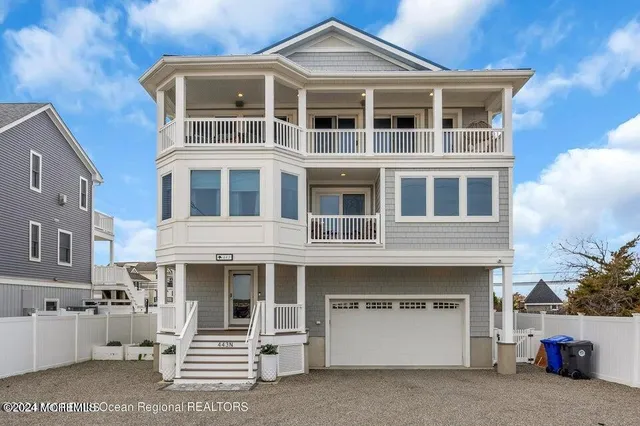 a front view of a building with a garage