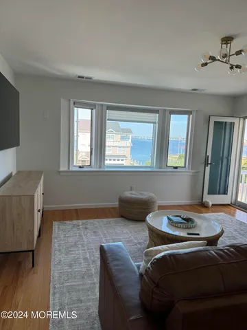 a bedroom with a bed and a table