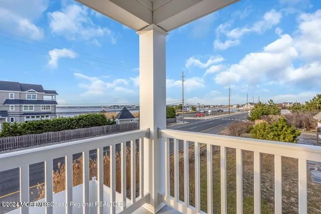 a view of a balcony with city view