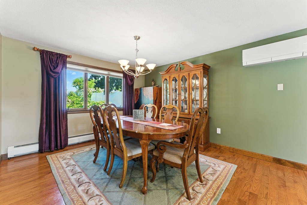 51 Newcrest Street Ludlow, MA 01056 - Photo 18 of 38 a view of a dining room with furniture window and outside view
