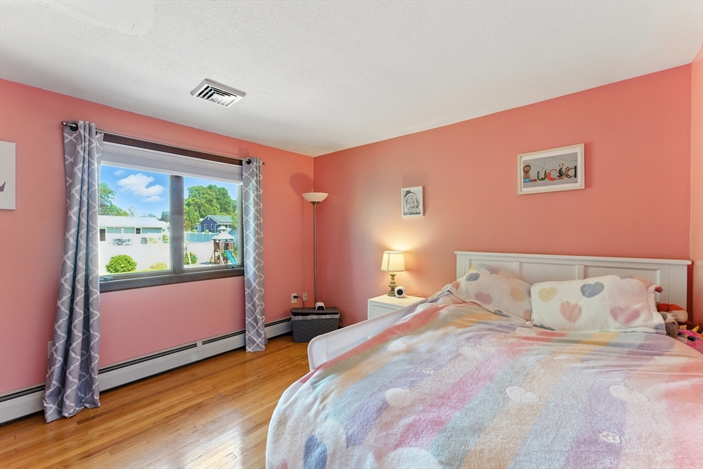 51 Newcrest Street Ludlow, MA 01056 - Photo 23 of 38 a bedroom with a bed and a window