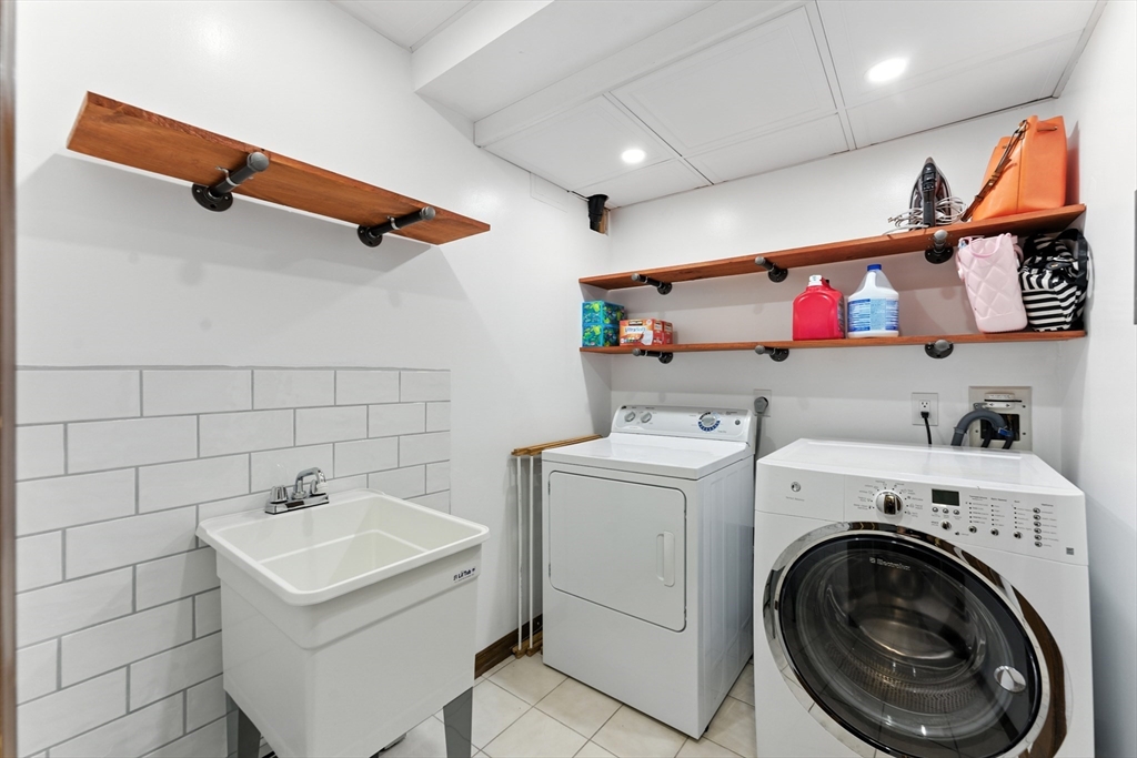 51 Newcrest Street Ludlow, MA 01056 - Photo 29 of 38 a utility room with dryer and washer