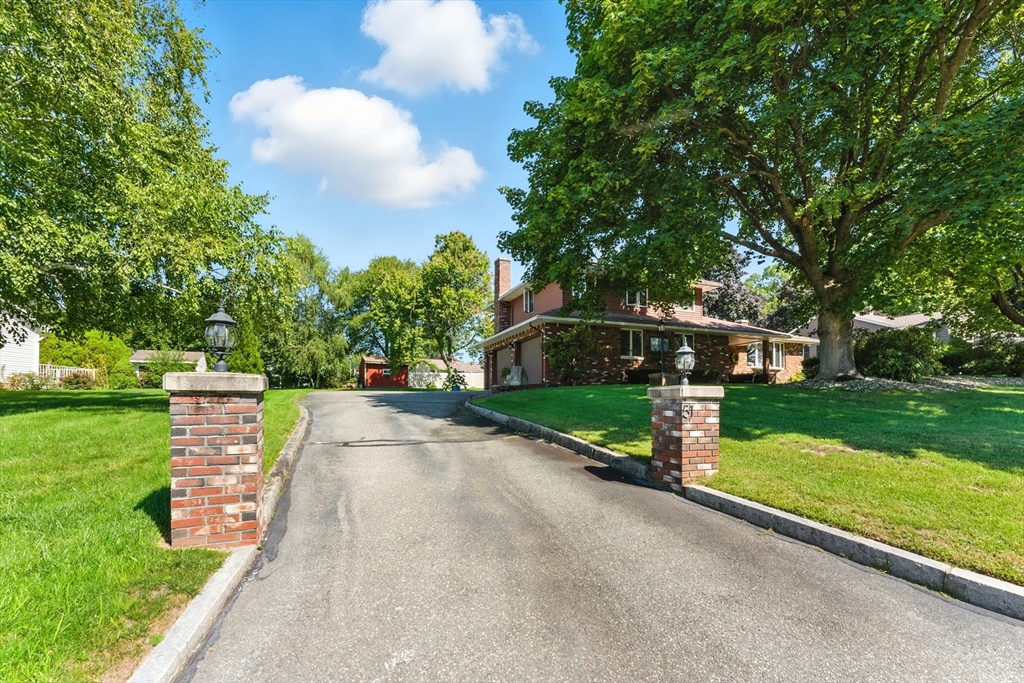 51 Newcrest Street Ludlow, MA 01056 - Photo 5 of 38 a view of a park with large trees