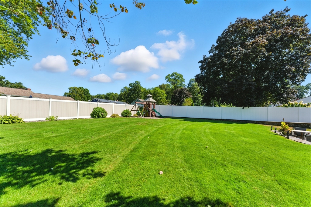 51 Newcrest Street Ludlow, MA 01056 - Photo 7 of 38 a view of yard with swimming pool and seating area