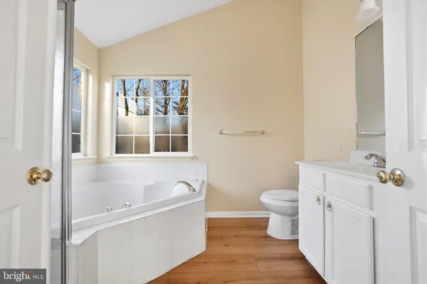 a bathroom with a toilet and a sink