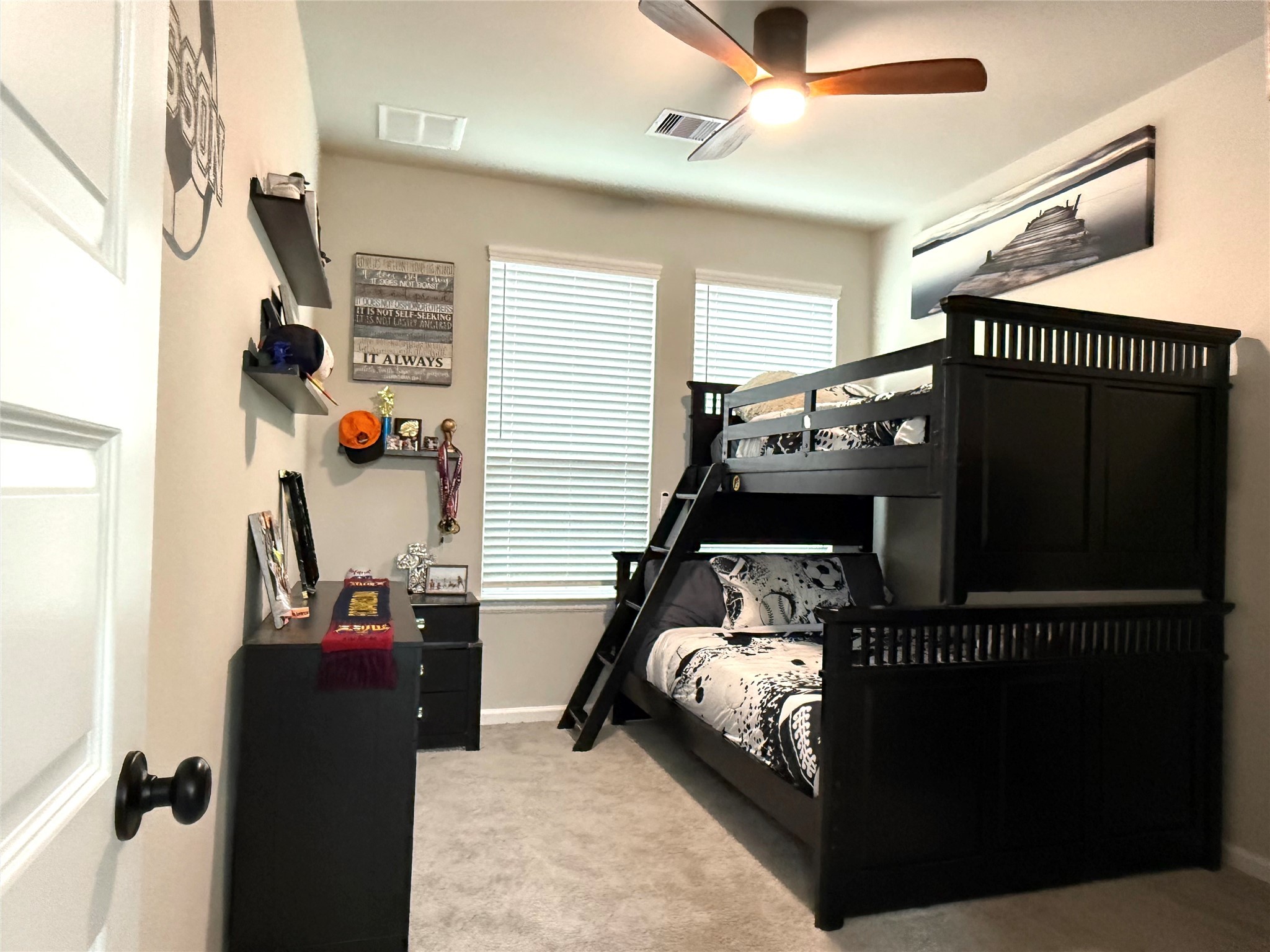 5614 Green Rise Lane Houston, TX 77091 - Photo 17 of 27 a bedroom with furniture and a window