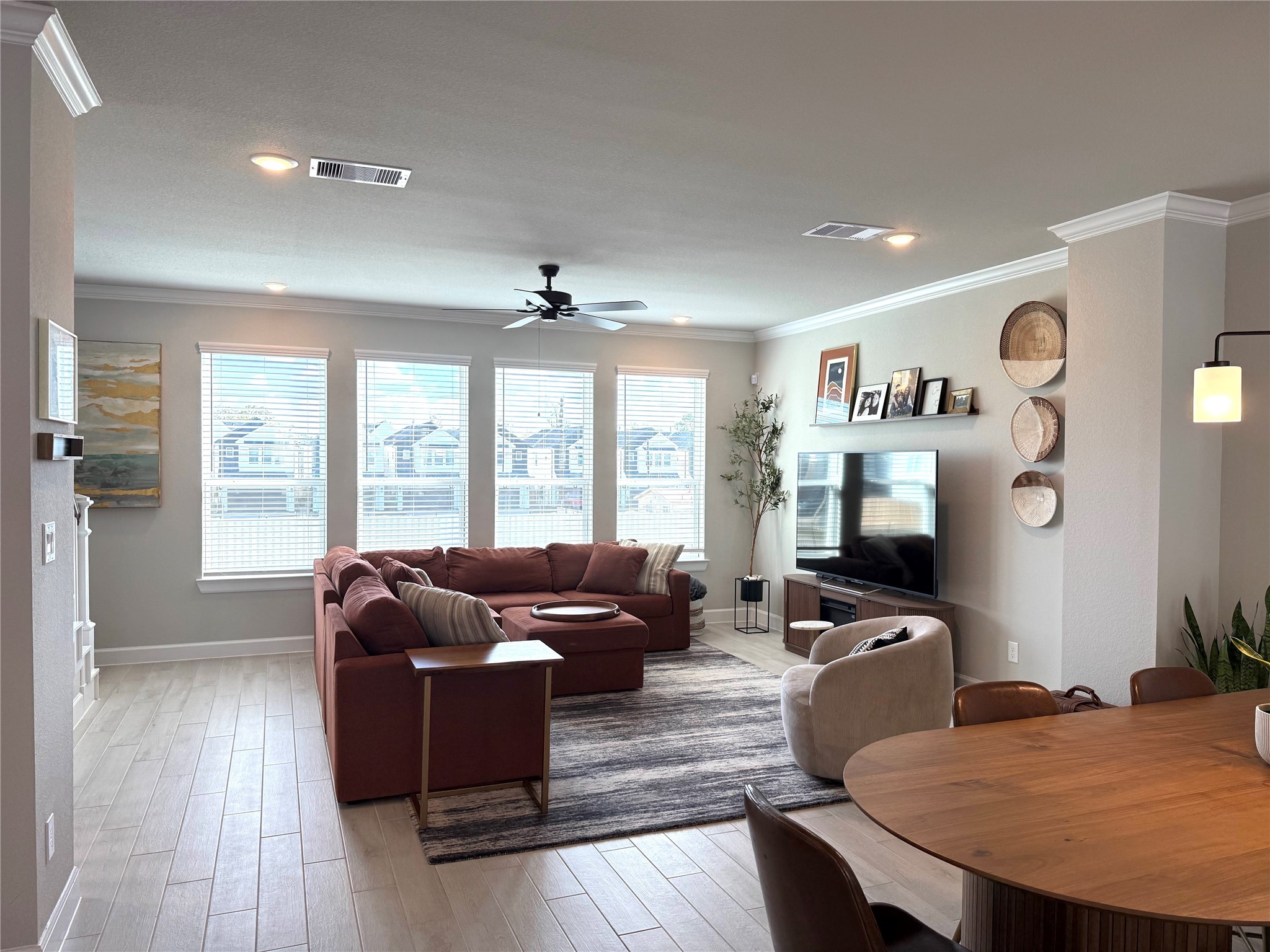 5614 Green Rise Lane Houston, TX 77091 - Photo 9 of 27 a living room with furniture flat screen tv and a large window