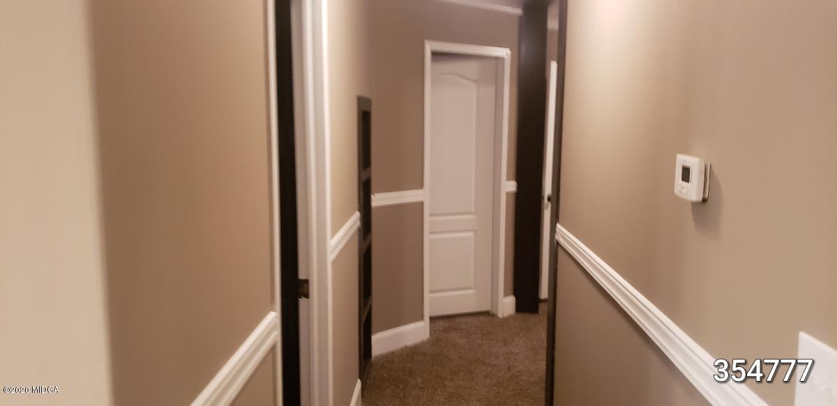 5700 Taylor Road Lizella, GA 31052 - Photo 11 of 23 a view of a hallway with hallway