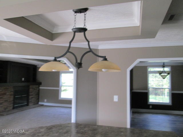 5700 Taylor Road Lizella, GA 31052 - Photo 18 of 23 a view of entryway and hall with wooden floor