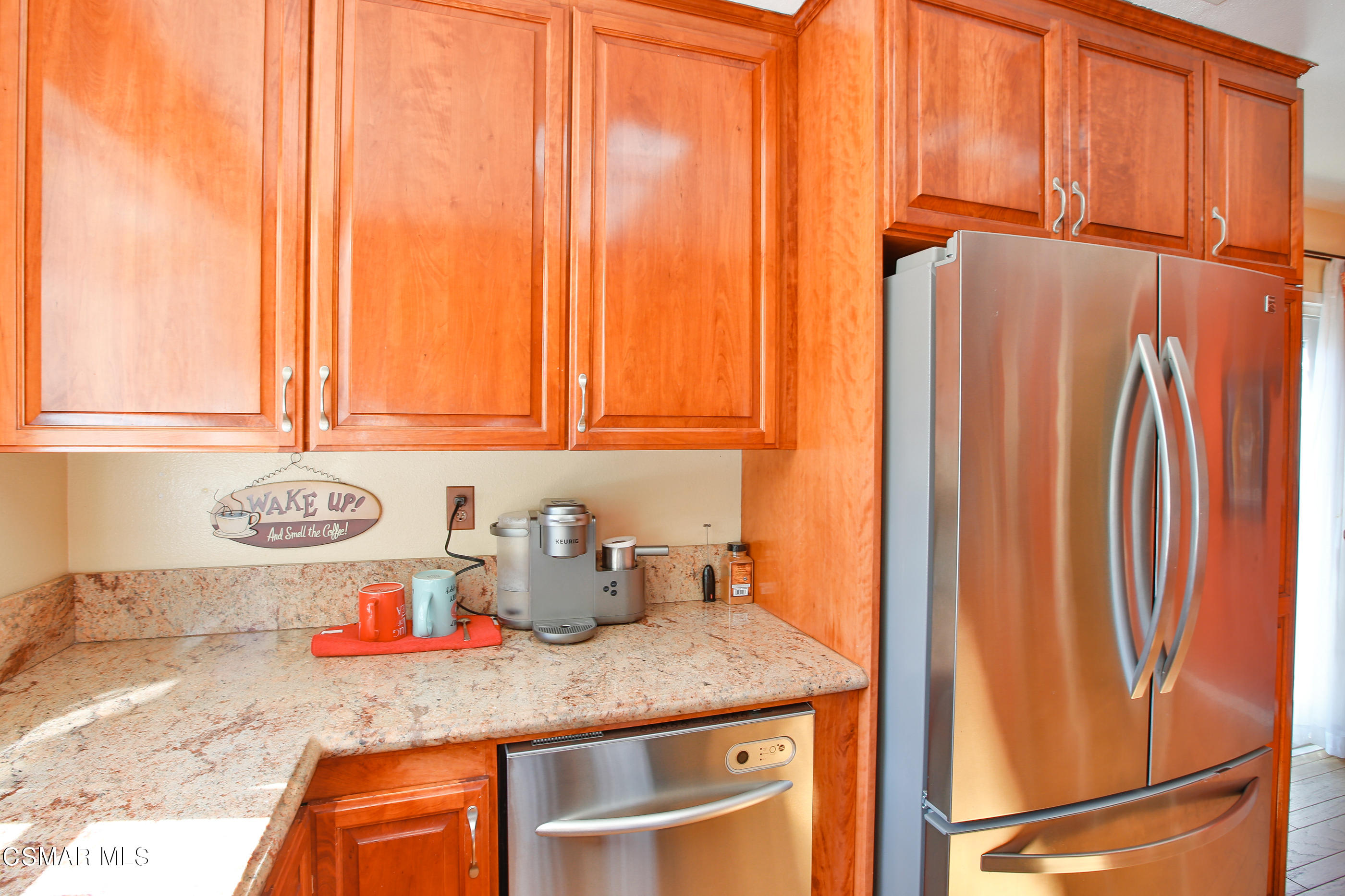 13152 East Millerton Road Moorpark, CA 93021 - Photo 11 of 36 a kitchen with a refrigerator and cabinets