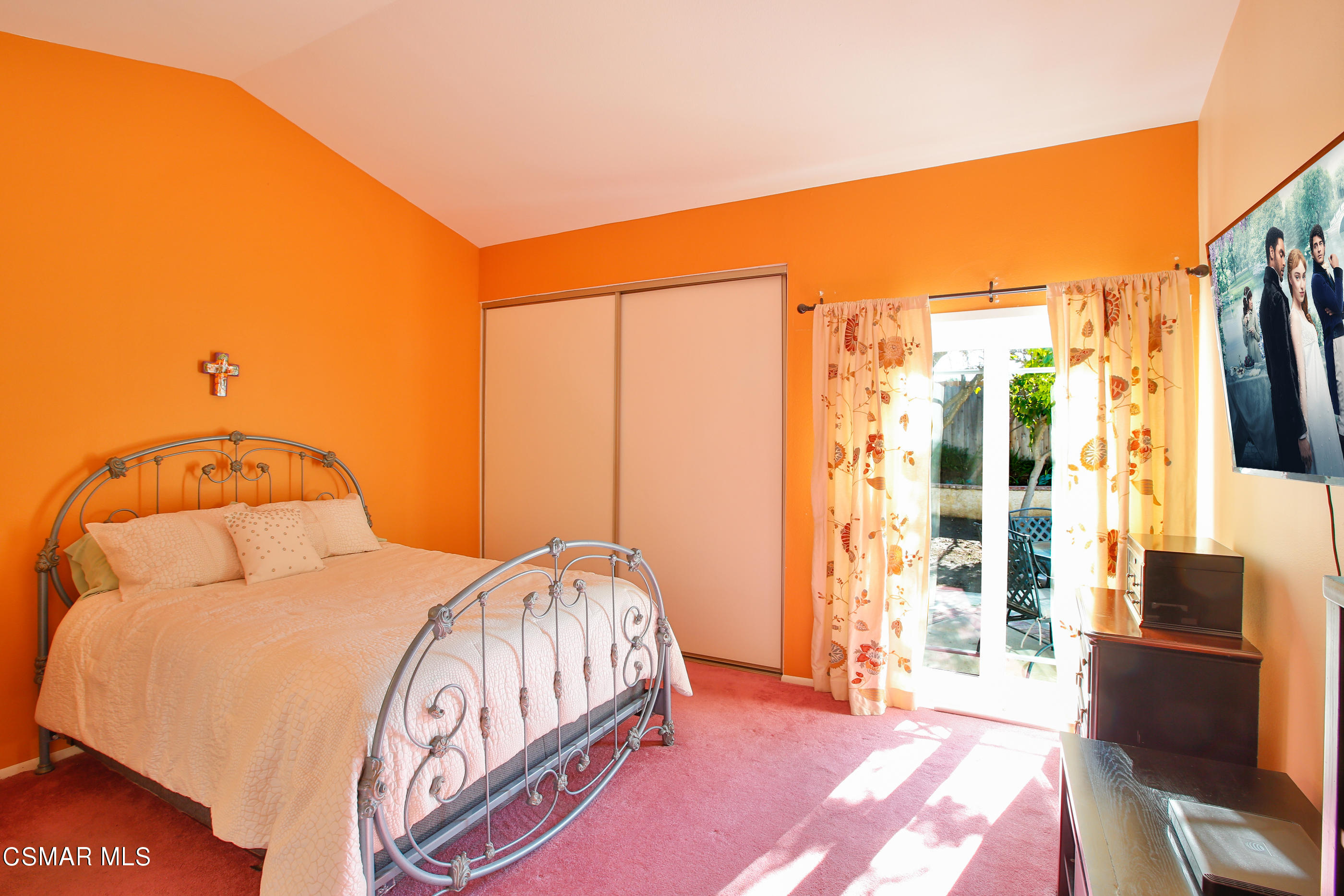 13152 East Millerton Road Moorpark, CA 93021 - Photo 15 of 36 a bedroom with a bed and glass door