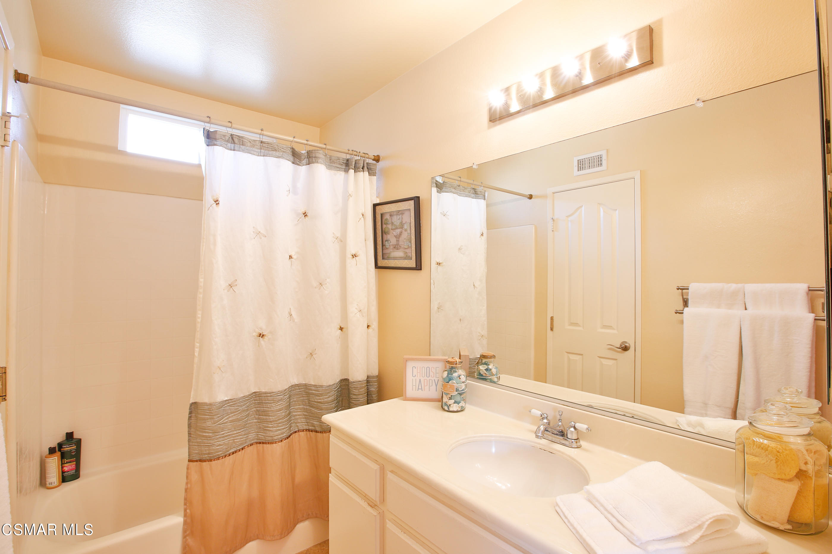 13152 East Millerton Road Moorpark, CA 93021 - Photo 17 of 36 a bathroom with a granite countertop sink and a mirror