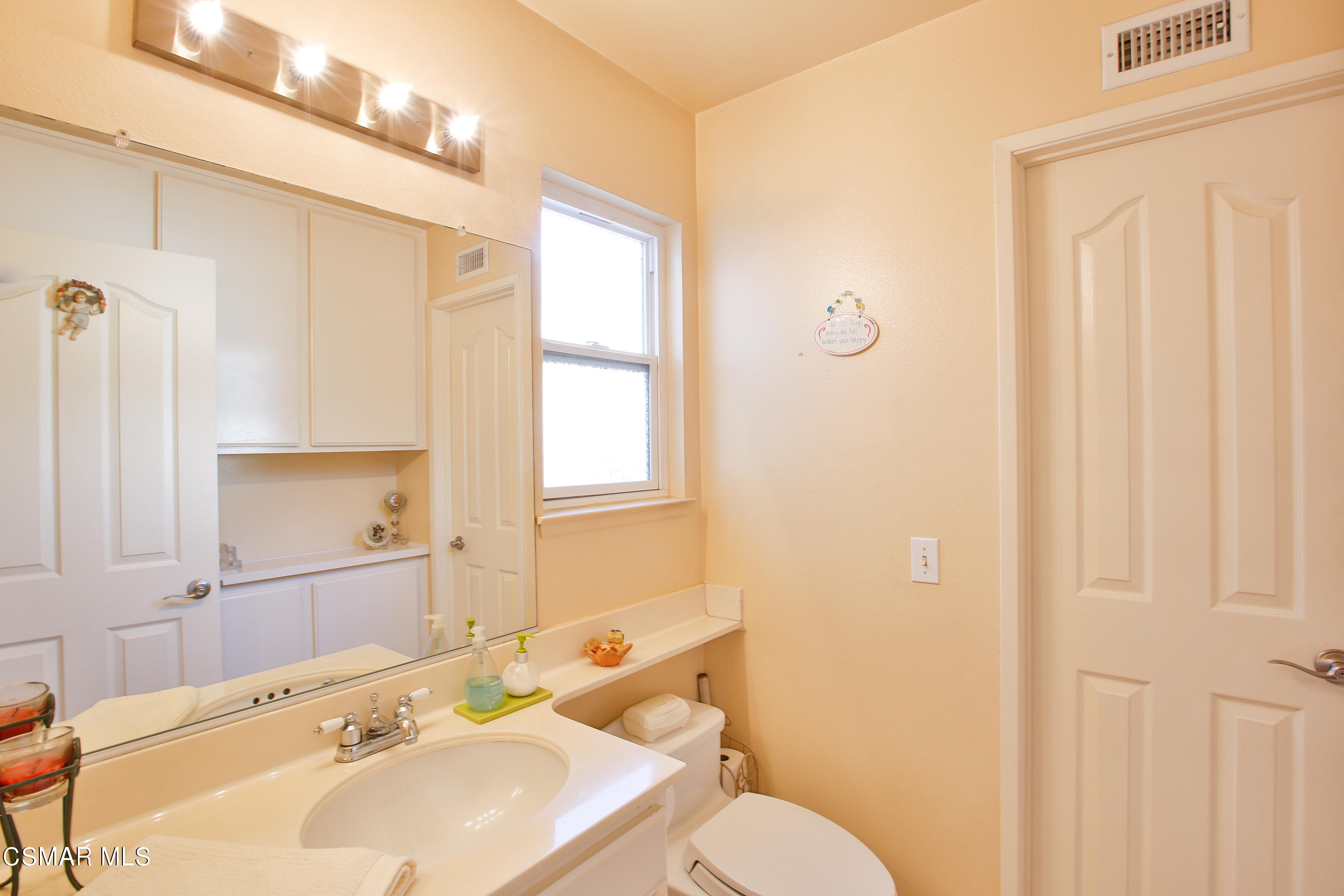 13152 East Millerton Road Moorpark, CA 93021 - Photo 18 of 36 a bathroom with a sink a toilet and shower