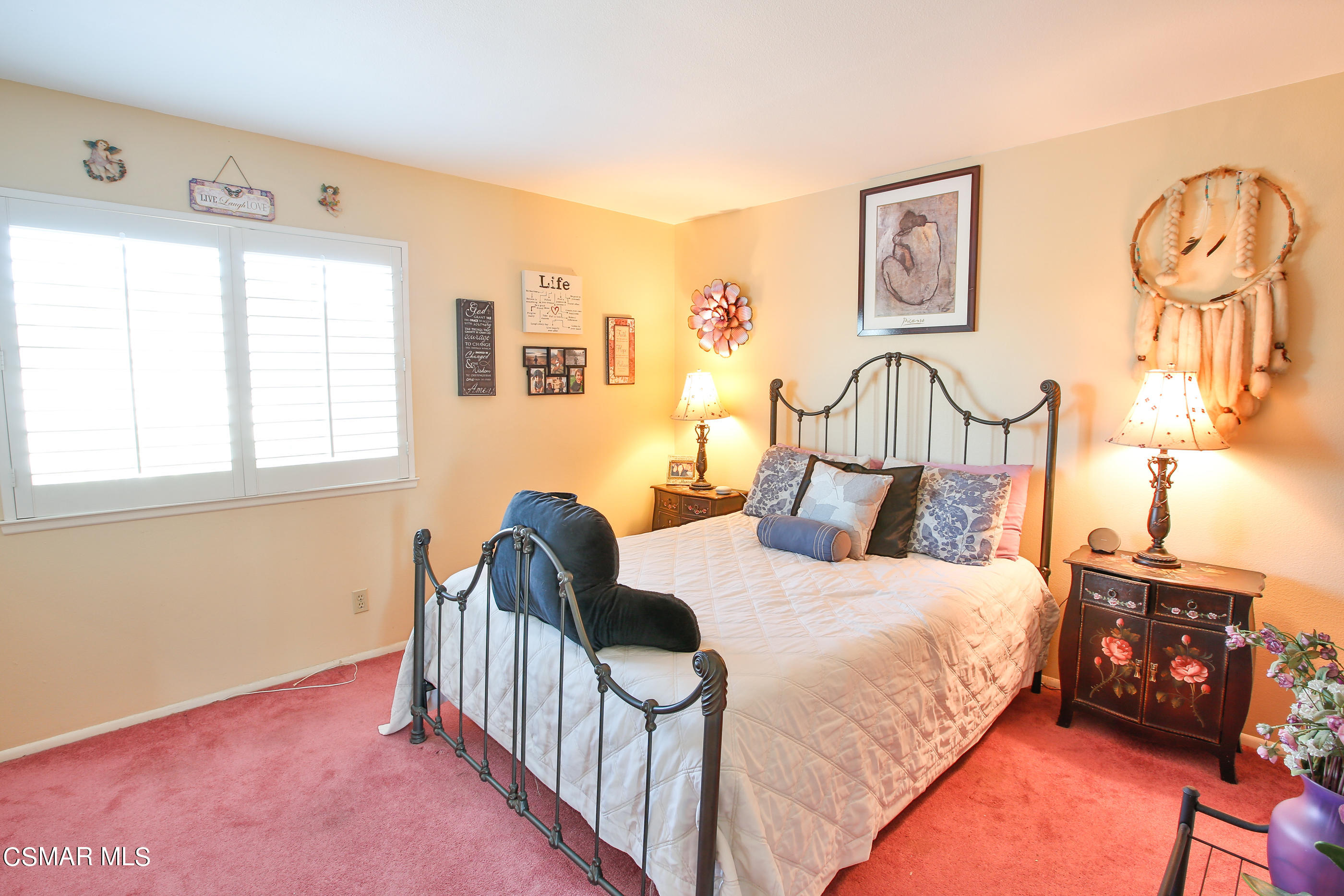 13152 East Millerton Road Moorpark, CA 93021 - Photo 21 of 36 a bedroom with a bed a couch and dresser