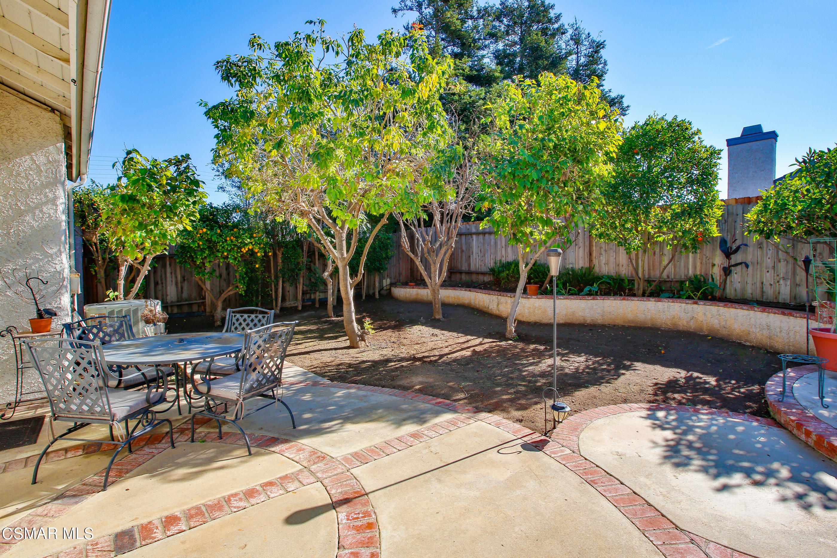 13152 East Millerton Road Moorpark, CA 93021 - Photo 29 of 36 a view of a backyard with a sitting area