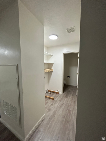 203 North Geneva Road, Unit 10 Provo, UT 84601 - Photo 11 of 16 Hallway featuring wood-finish flooring, white baseboards, and recessed lighting