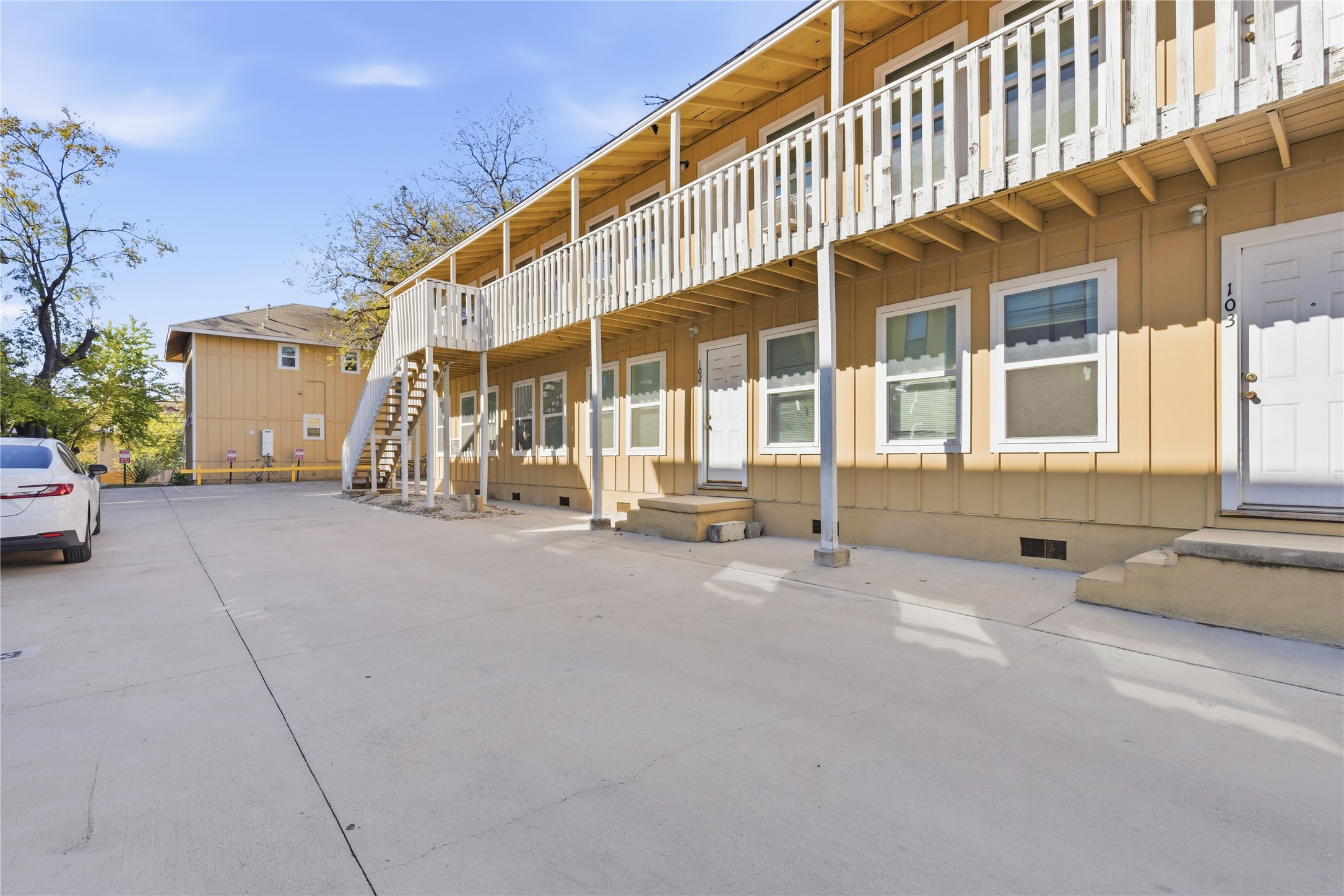 204 East 30th Street, Unit 201 Austin, TX 78705 - Photo 16 of 18 front view of a building with a street
