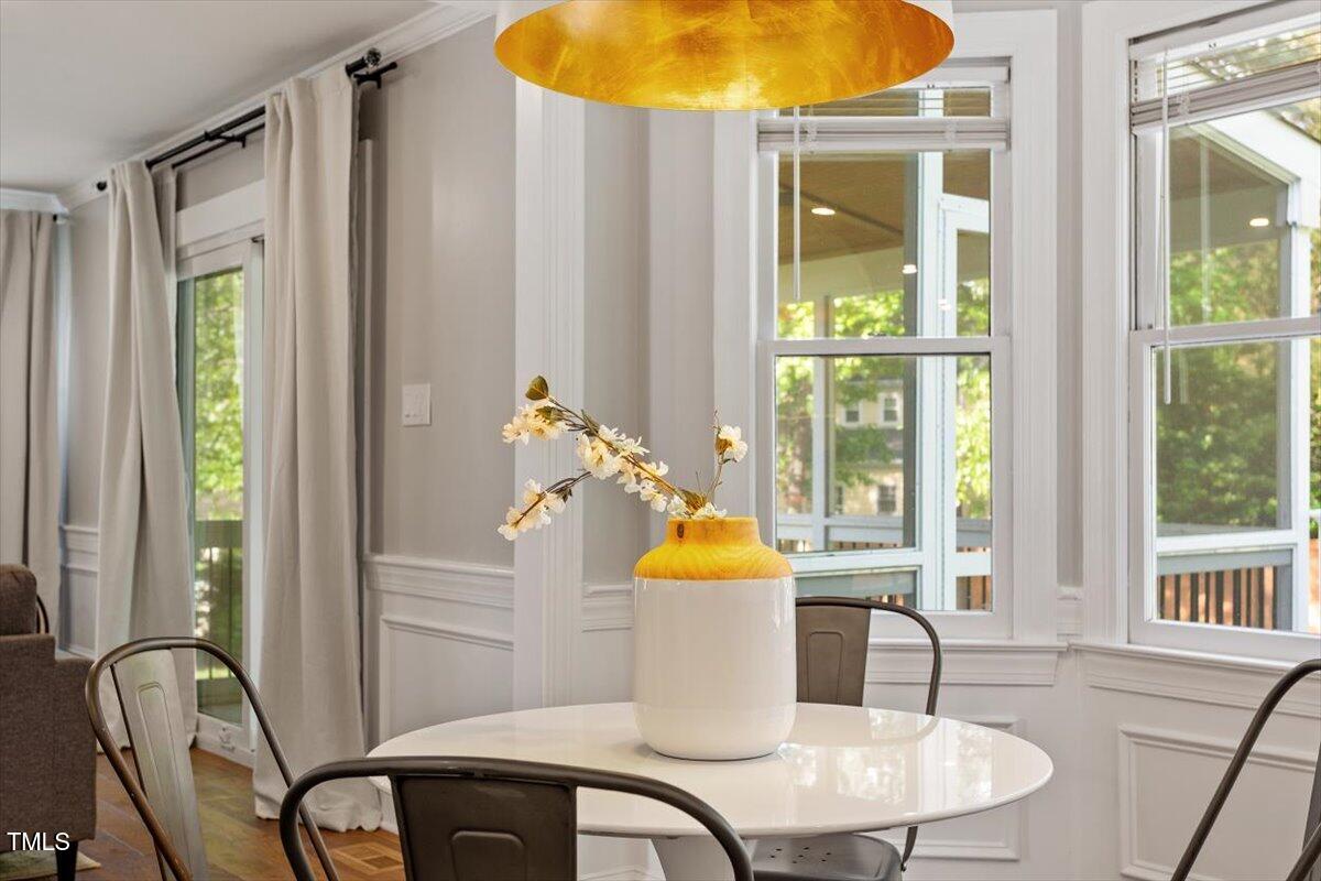 7209 Halstead Lane Raleigh, NC 27613 - Photo 24 of 64 a view of a dining room with furniture window and outside view