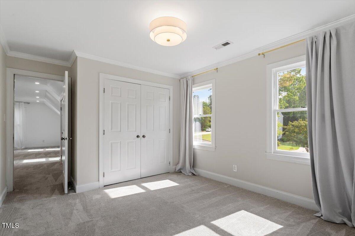 7209 Halstead Lane Raleigh, NC 27613 - Photo 45 of 64 a view of an empty room with a window