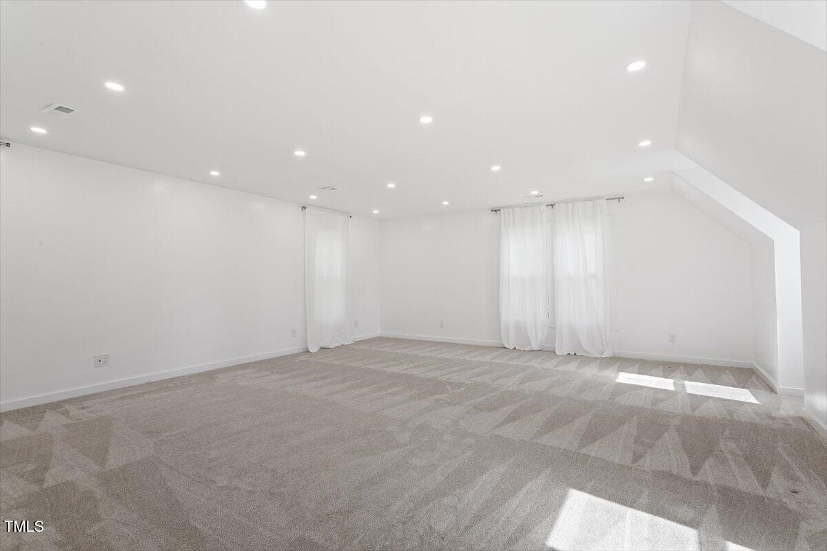 7209 Halstead Lane Raleigh, NC 27613 - Photo 46 of 64 a view of an empty room