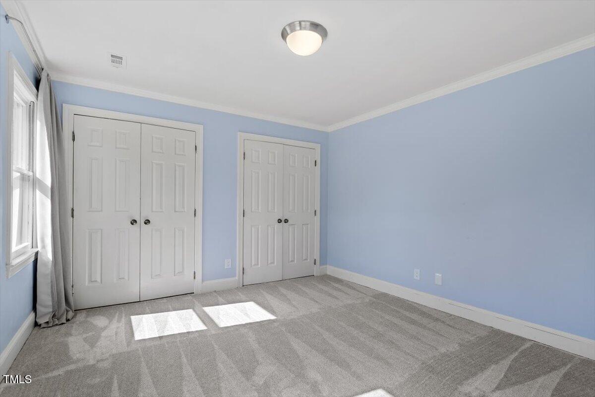 7209 Halstead Lane Raleigh, NC 27613 - Photo 49 of 64 a view of an empty room