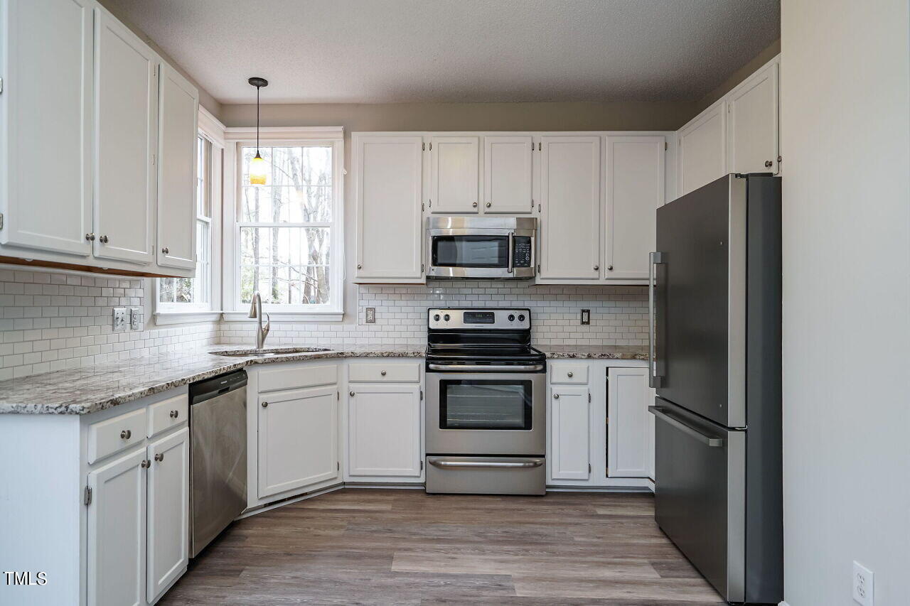 9312 Carisbrook Court Raleigh, NC 27615 - Photo 11 of 30 012-1280x960-kitchen