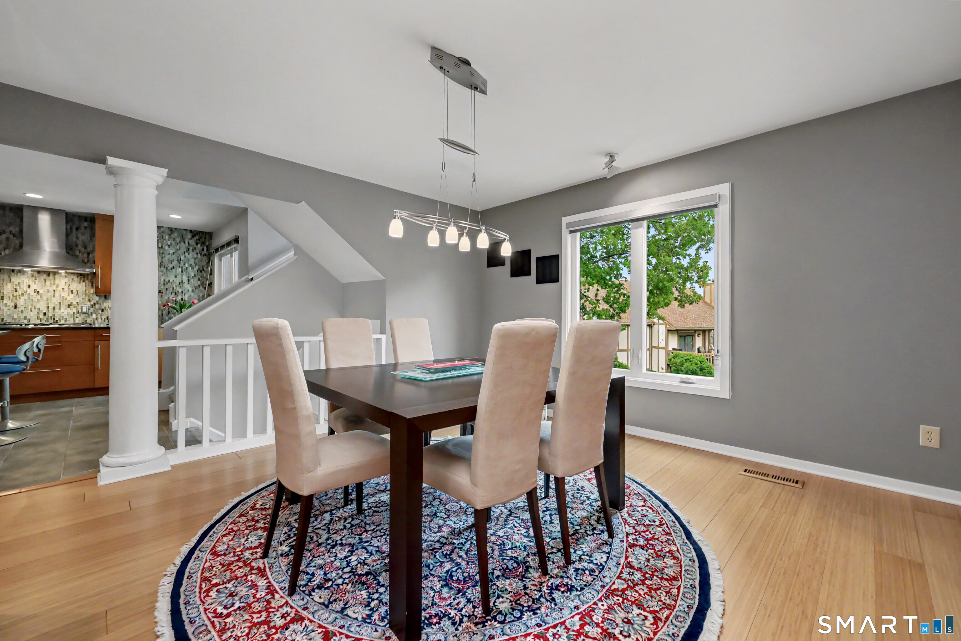 690 Forest Road, Unit 642 West Haven, CT 06516 - Photo 17 of 40 Column adds a touch of elegance to the dining room that has fabulous seasonal views of our beloved Elm City!