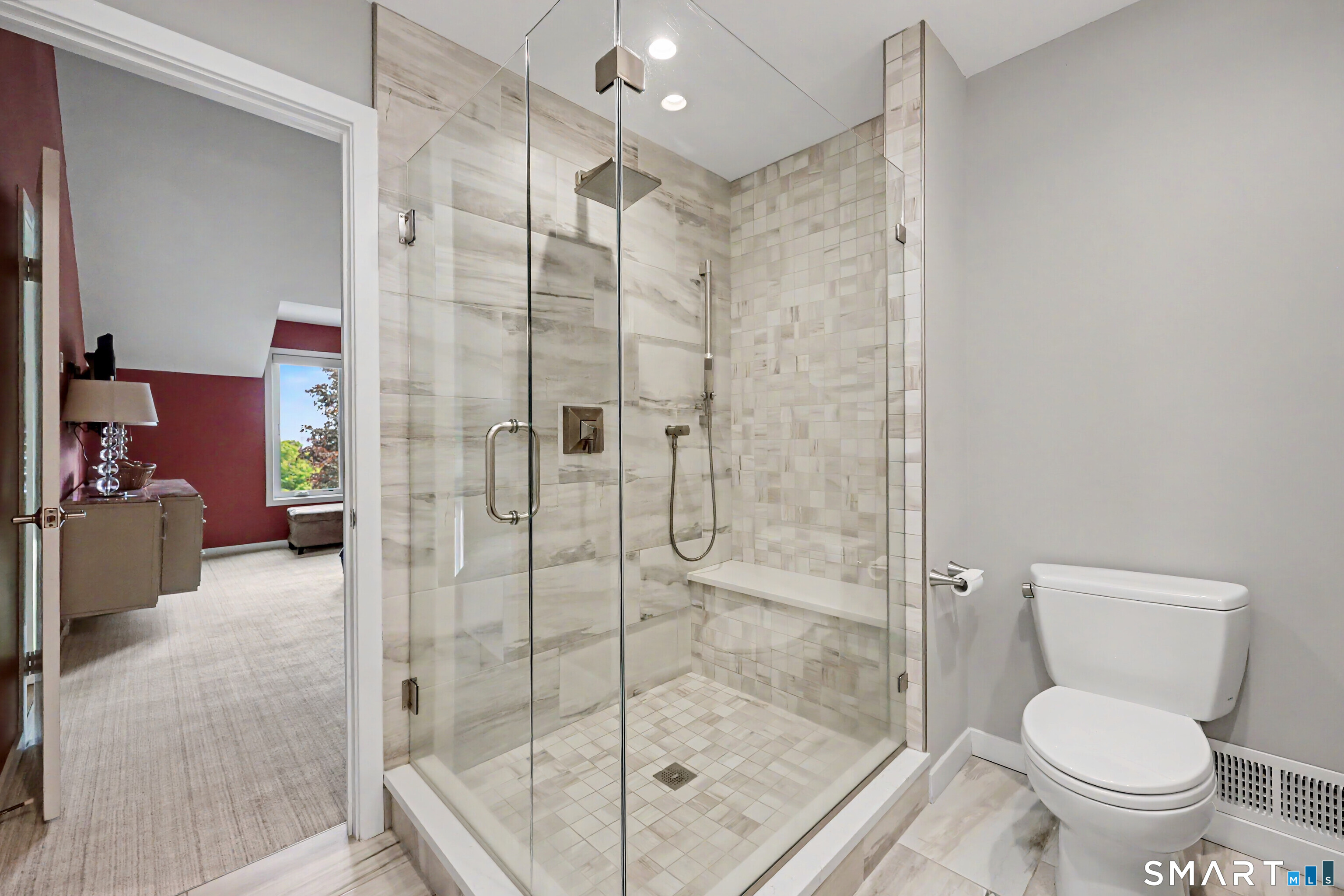 690 Forest Road, Unit 642 West Haven, CT 06516 - Photo 24 of 40 You can see the quality construction in this impeccably renovated bath. Oversized tile shower with built in seat, rain forest shower head plus hand held shower and with a high end glass door, every detail has been carefully thought out