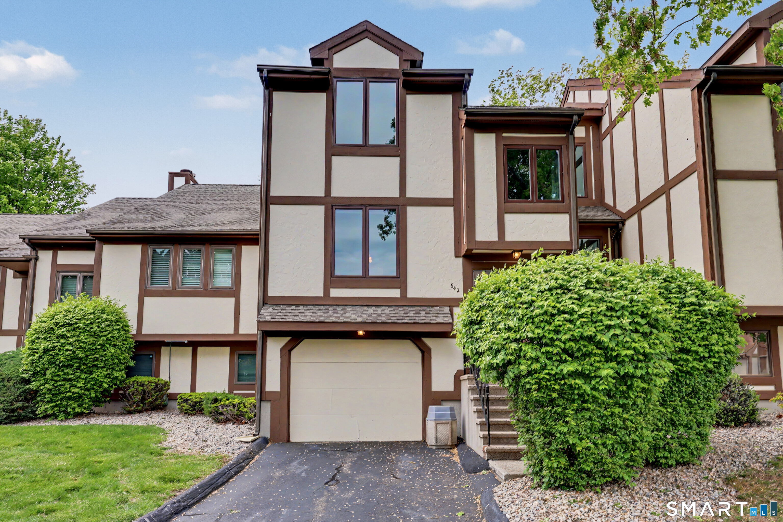 690 Forest Road, Unit 642 West Haven, CT 06516 - Photo 35 of 40 Primary bedroom is top window, dining room just over garage- both afford fabulous views of the city!