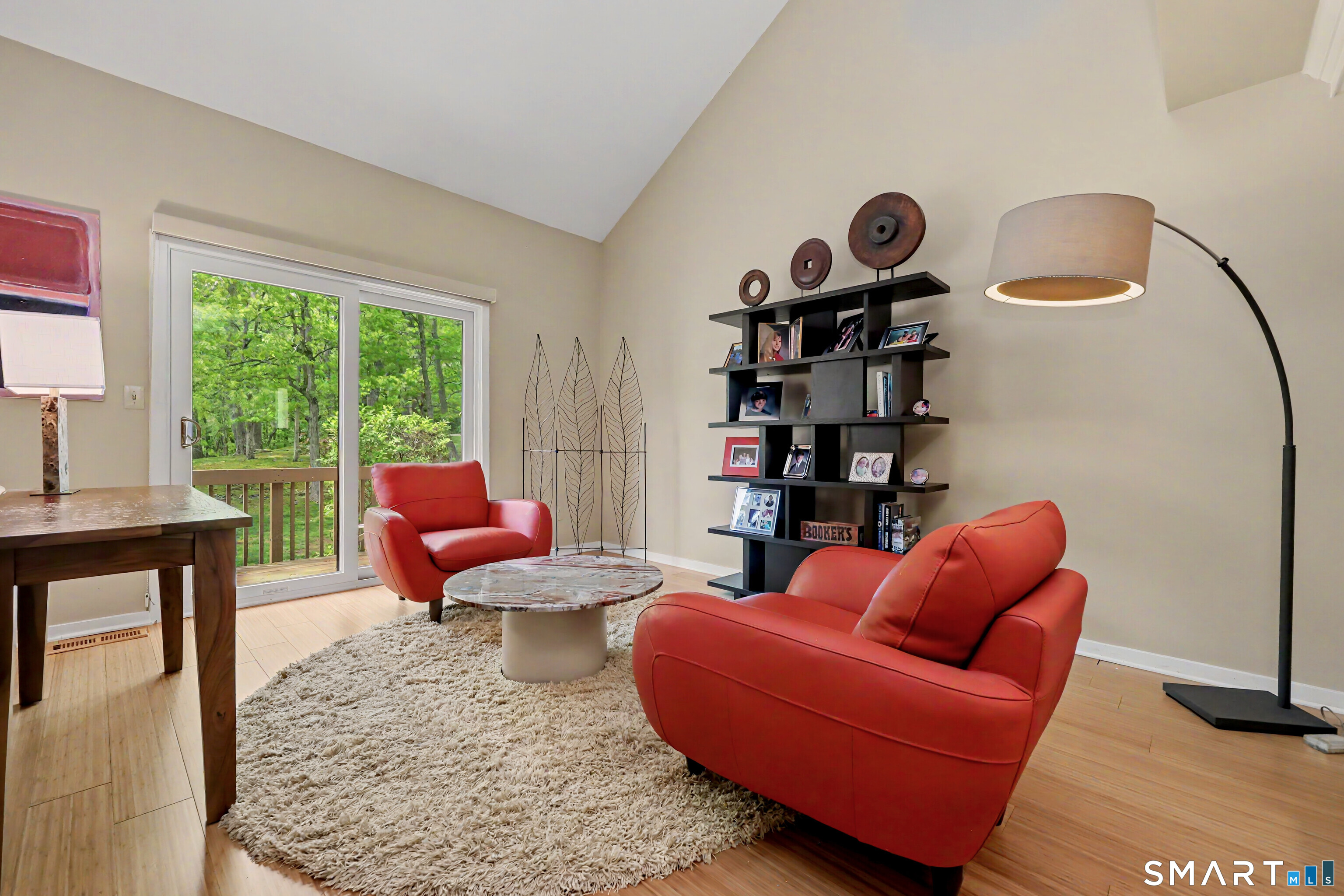 690 Forest Road, Unit 642 West Haven, CT 06516 - Photo 8 of 40 Conversation nook features sliders to deck