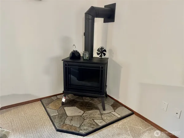 a kitchen with stainless steel appliances a refrigerator and a stove top oven