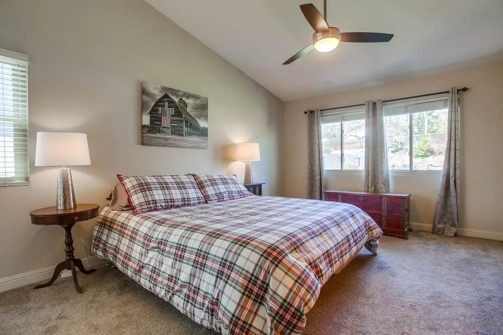 13036 Treecrest Street Poway, CA 92064 - Photo 13 of 37 a bedroom with a bed and a window
