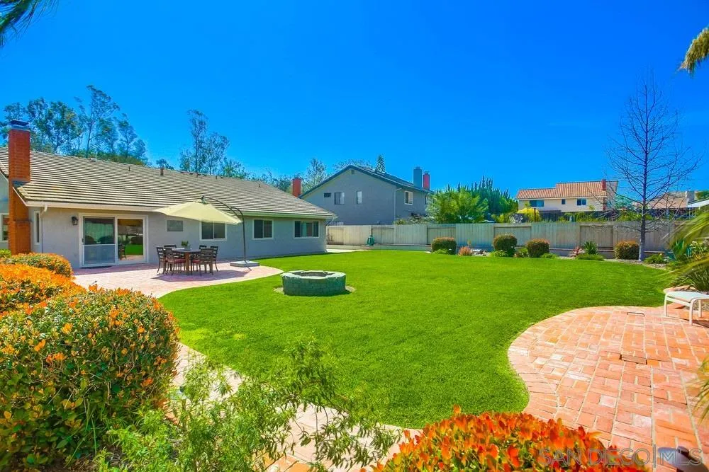 13036 Treecrest Street Poway, CA 92064 - Photo 28 of 37 a front view of a house with garden