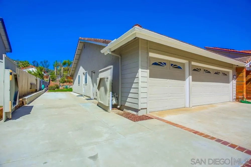 13036 Treecrest Street Poway, CA 92064 - Photo 34 of 37 a view of a house with a garage