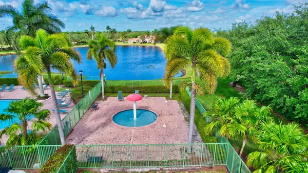 a view of swimming pool with a yard