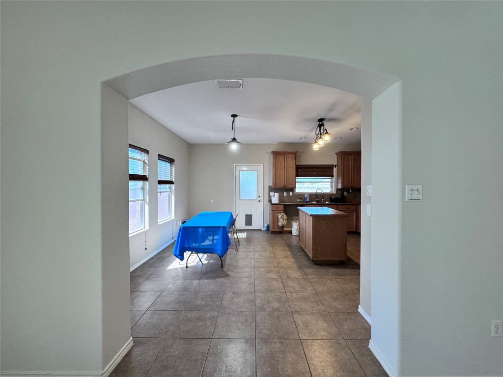 11202 Granados Street Laredo, TX 78045 - Photo 13 of 17 a living room with furniture and kitchen view