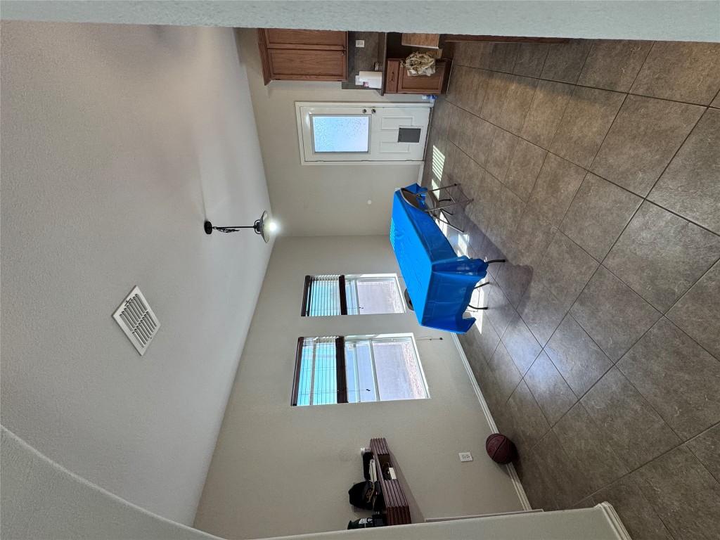 11202 Granados Street Laredo, TX 78045 - Photo 14 of 17 a view of a livingroom with furniture and a ceiling fan
