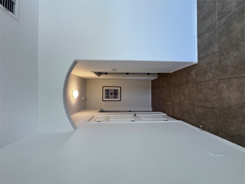 11202 Granados Street Laredo, TX 78045 - Photo 7 of 17 a view of a hallway with wooden floor
