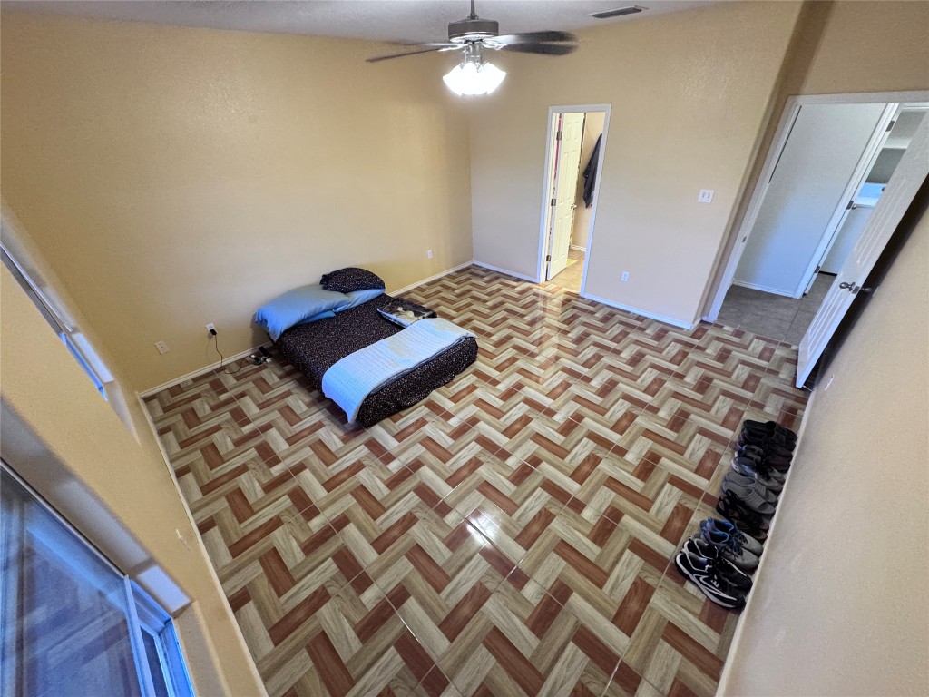 11202 Granados Street Laredo, TX 78045 - Photo 9 of 17 a living room with a rug