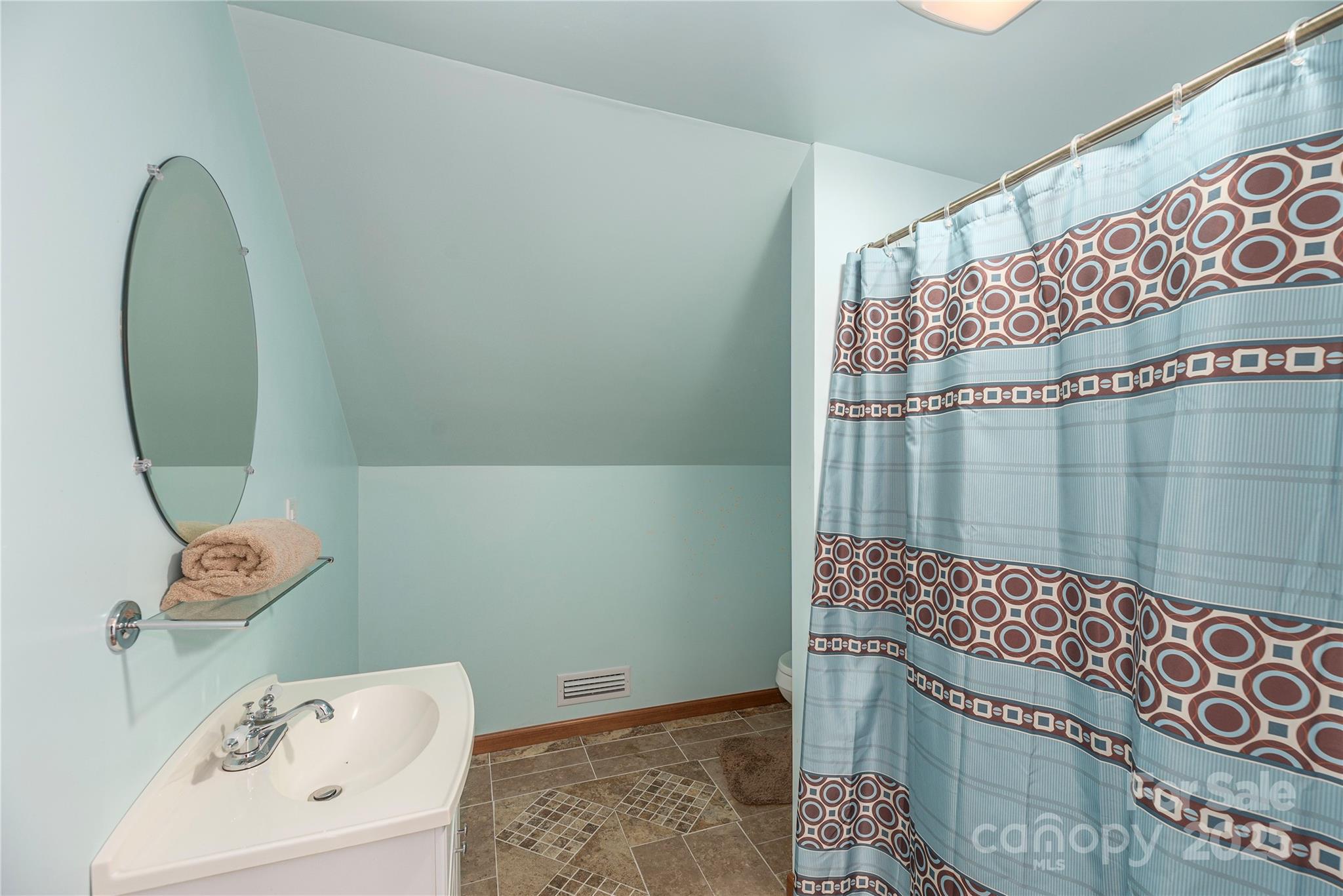236 Pole Miller Extension Brevard, NC 28712 - Photo 20 of 38 a bathroom with a bathtub and shower