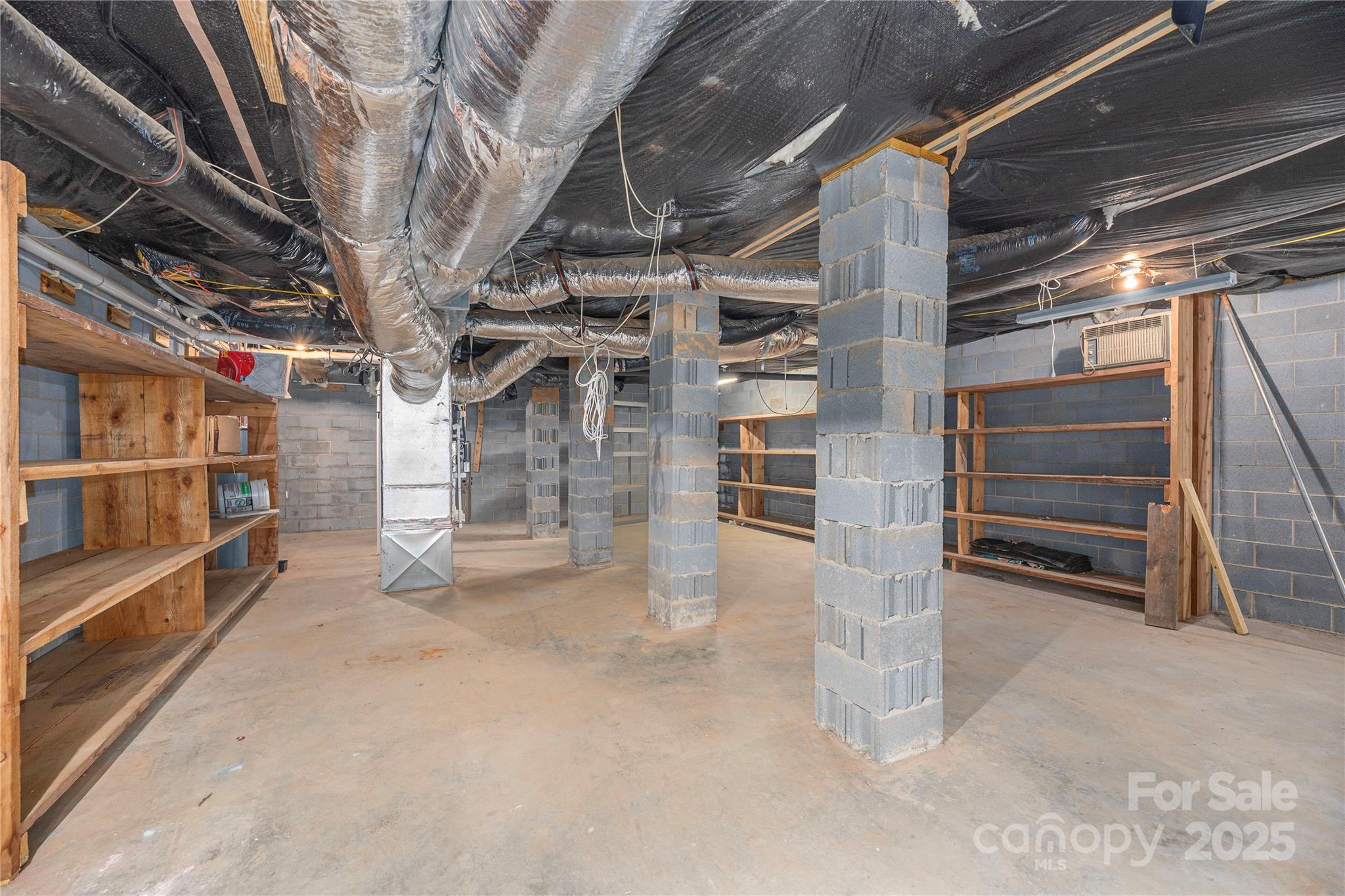 236 Pole Miller Extension Brevard, NC 28712 - Photo 24 of 38 a view of an empty room with a garage
