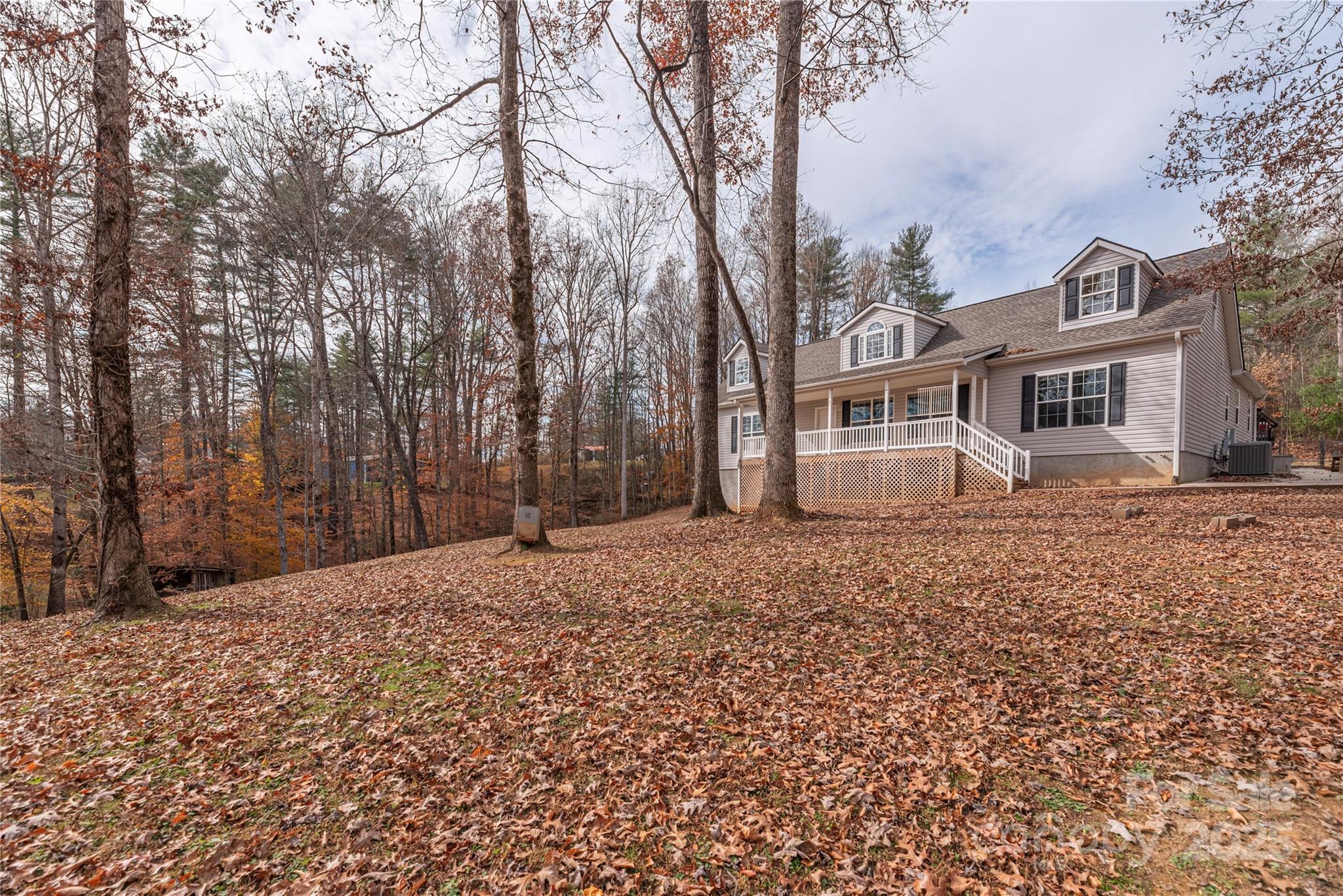 236 Pole Miller Extension Brevard, NC 28712 - Photo 34 of 38 a front view of a house with a yard