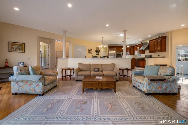 a living room with furniture and a couch